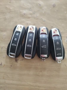 LOT 4 FACTORY OEM PORSCHE KEYLESS ENTRY REMOTE KEY FOB MIXED KEY FOB LOT - Picture 1 of 1