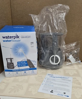Waterpik Acuario Hilo dental de agua Dientes Gris WP-667CD Caja Foto 1 de 4