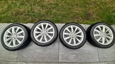 4 Golf Winterräder 205/50 R17 93H, VW-Dijon-Alufelgen, VW-Nabenkappen, Michelin - Bild 1 von 3