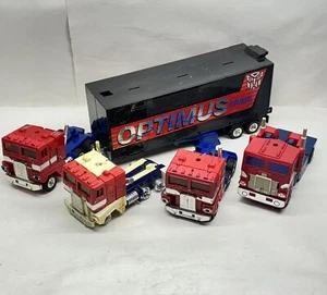 Lot of 4 Transformers Optimus Prime Figures with Trailer (Missing Parts) - Picture 1 of 7