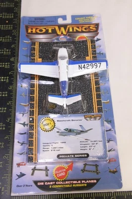 Hot Wings Beechcraft Bonanza 2021 #13112 Die Cast Metal Airplane NEW Old Stock - Image 1 of 3