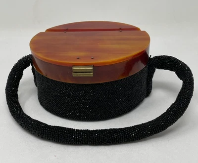 ANTIGA CAIXA DE MIÇANGAS PRETA ART DÉCO E BOLSA DE MÃO FEMININA LARANJA BAQUELITE - Imagem 1 de 4