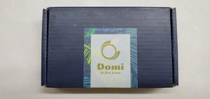 Gitarren-Kapo-Geschenkset - enthält 1 Kapodaster, 1 Plektrenhalter, 6 Plektren - Bild 1 von 4