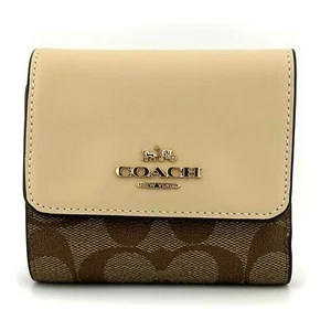 Cartera Coach pequeña triple pliegue en lona bloqueada caqui marfil CE930 - Imagen 1 de 6