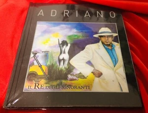 🌈CD N° 10 - ADRIANO CELENTANO - IL RE degli IGNORANTI - NUOVO😎SIGILLATO - Foto 1 di 2