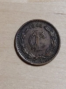 Mexico 1 centavo coin, 1948. KM# 415, bronze. Coat of arms. - Picture 1 of 4