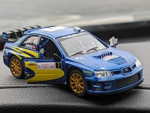 CAPTIVATING & SLEEK SUBARU IMPREZA WRX 2007 'WORLD RALLY TEAM' 1:36 SCALE NWT - Picture 1 of 24