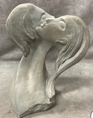 Escultura "Rostros del amor" de David Fisher Austin Productions Foto 1 de 4