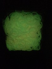 Loom Bands Glow In The Dark 4 packs of 600.  2400 total with clips  new in bag 
