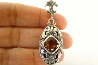 Colgante colgante solitario de citrino amarillo dorado ornamentado de plata de ley 925 Foto 1 de 4