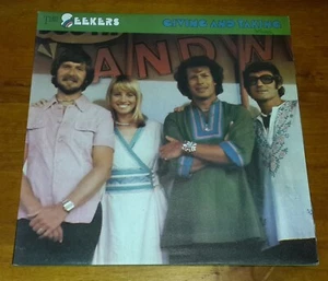 GIVING AND TAKING 12" VINYL LP BY THE SEEKERS FROM 1975 EXCELLENT CONDITION - Picture 1 of 6