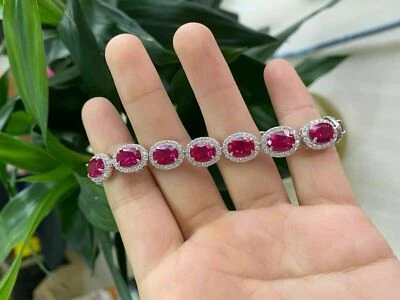Brazalete de boda de tenis de diamantes rubí creado en laboratorio ovalado de 5 quilates enchapado en oro blanco de 14 quilates Foto 1 de 4