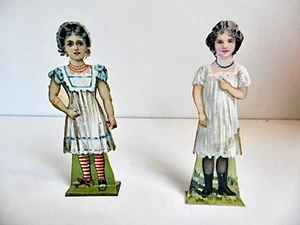 DEUX POUPÉES ANCIENNES EN CARTON À HABILLER - 3 TENUES - DÉBUT XXème - Imagen 1 de 6