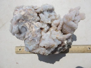 745  DISPLAY YOUNGITE, BEAUTIFUL CHALCEDONY COATING.  GUERNSEY, WY.  FLUORESCENT - Picture 1 of 11