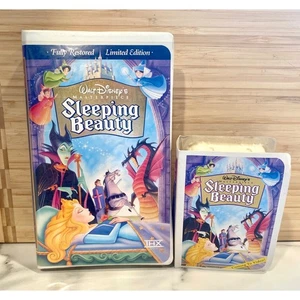 Sleeping Beauty VHS + 1996 McDonald’s Toy Disney Lot - Picture 1 of 7