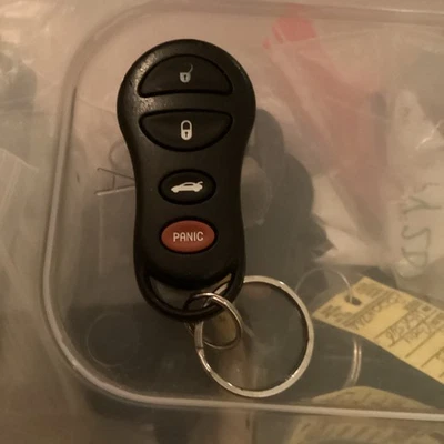 MINT 1999-2000 CHRYSLER 300M KEYLESS ENTRY REMOTE 04602268 GQ43VT9T OEM KEY FOB - Image 1 of 2