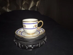 ANTIGUA TAZA Y PLATILLO J.P. L. FRANCE LIMOGES DEMITASSE MANGO DE LLANTAS ADORNADAS EN ORO - Imagen 1 de 4