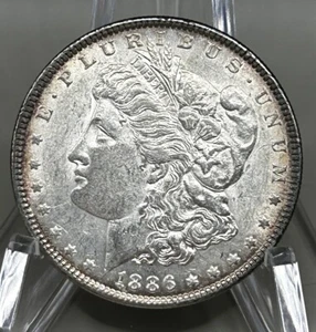 1886 $1 Morgan Silver Dollar UNC - 24447 - Picture 1 of 2