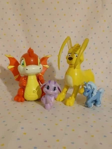 Figuras de juguete vintage Y2K Neopets Scorchio Gelert Poogle Uni Thinkway LEER - Imagen 1 de 12
