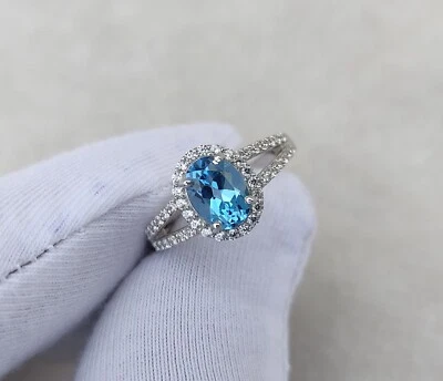 1.50Ct. Genuine Blue Topaz Oval Cut Halo Diamond Women's Ring White Gold Finish - Image 1 of 4