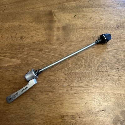 Pincho trasero Shimano Deore XT liberación rápida 135/165 mm plateado Foto 1 de 4