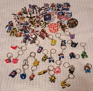 Transformers Favores Fiesta 24 Llaveros 50 Pegatinas Nuevo - Imagen 1 de 1