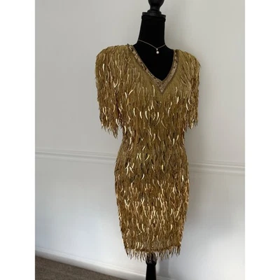 Vestido de cóctel vintage años 80/90 Oleg Cassini negro corbata dorada daga lentejuelas seda S Foto 1 de 4