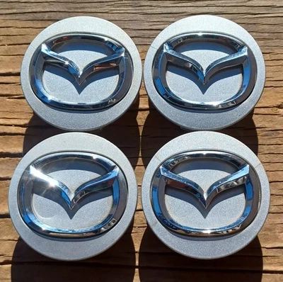 Mazda  CX3, CX5 CX9 3 6  Miata center cap set of 4, 2010-2023, P/N BBM237190 S - Image 1 of 3
