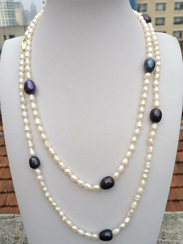 40" Incredible Design South Sea Natural Rice White + Big Black Pearl Necklace - Image 1 of 4