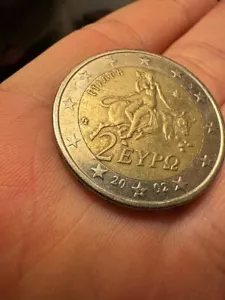 More details for greece 2 euro coin (2002) with an “s” print into one of the stars at the bottom
