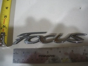 FORD EXPLORER SYMBOL BAGDE CHROME BLACK OEM ORIGINAL USED - Imagen 1 de 1