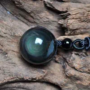 pendentif en obsidienne oeil céleste avec cordon (sphére1.6 cm ) - Afbeelding 1 van 3
