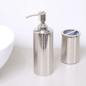 Botella de loción dispensadora de jabón de metal con textura plateada cromada brillante metálica - Imagen 1 de 8