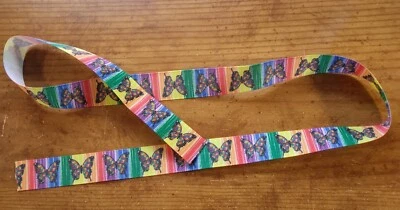 Grosgrain Ribbon Butterfly on multi color background 273887 - Image 1 of 2