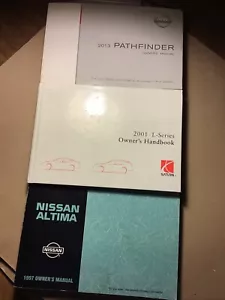 Owner’s Manual Lot ‘97 Nissan Altima ‘13 Nissan Pathfinder ‘01 Saturn L-Series - Picture 1 of 11