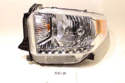 Nueva lámpara de luz de cabeza genuina OEM Toyota Tundra 2014-2017 montaje en chip nivelación izquierda Foto 1 de 4