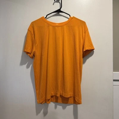 ¡LINDO! Camiseta Lululemon Talla 14 Train to Be en Naranja Iluminado Foto 1 de 4