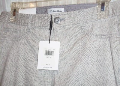 全新 女式 CALVIN KLEIN 身体合身 紧身裤 牛仔裤 象牙色 灰色 动物印花 S 2 — 第 1/4 张图片