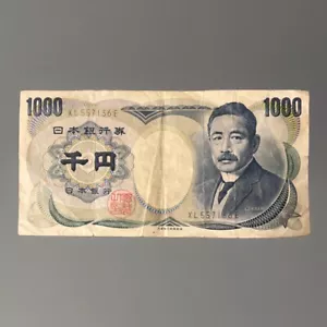World Paper Money - Japanese 1000 Yen XL557136E @ F-VF - Picture 1 of 2