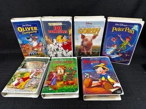 Walt Disney VHS Lot Of 7 Movies Clam Shell Pooh Pan Gordy Oliver Robin Dalmatian - Picture 1 of 11