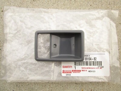 84 - 89 TOYOTA 4RUNNER DELANTERO IZQUIERDO INTERIOR MANIJA PUERTA BISEL MOLDURA GRIS NUEVO Foto 1 de 3