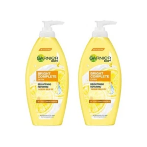 Paquete de 400 ml 2 Garnier Light completo blanqueamiento extra reparación corporal leche UV - Imagen 1 de 6