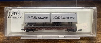Atlas N Scale 50' Flatcar w/ Two Trailers: 3752 Pennsylvania With REA Trailers - Image 1 of 3