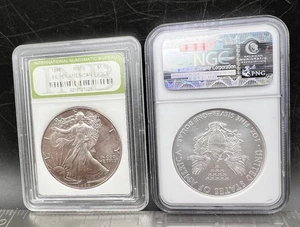 Lot of 2 -1 oz Silver American Eagles  NGC MS6 -2010 & INB MS70-1986- Item#1071 - Picture 1 of 5