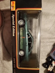Maestro Verde BMW 850i 1:18 - Foto 1 di 3