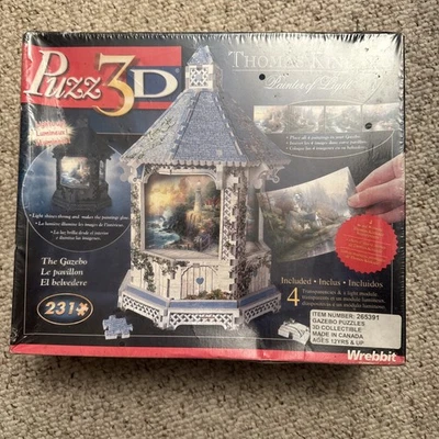 Головоломка Wrebbit Thomas Kinkade The Gazebo Lights Up 3D с пенопластовым покрытием - 231 шт. - Изображение 1 из 4