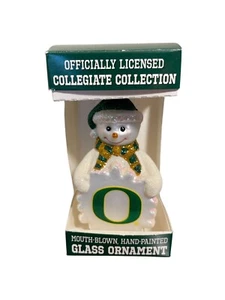Ornamento de muñeco de nieve de vidrio pintado a mano 2009 Universidad de Oregón - Old World Chris - Imagen 1 de 5