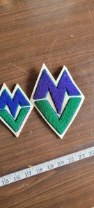 Embroidered patch with a stylized "MV" logo. Milwaukee Bucks Patch - Picture 1 of 7