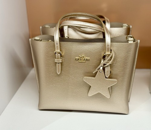 Borsa Coach Mollie Tote Bag 25 nuova con etichetta con ciondolo stella CX253 in oro metallizzato limitata
