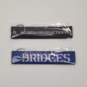 Death Stranding Bridges Kojima Productions Juego de 2 etiquetas de vuelo NUEVO - Imagen 1 de 1